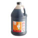 A Date Lady Organic Date Syrup gallon jug with a white lid.