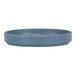 A Cal-Mil Hudson blue melamine plate with a raised rim.