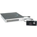 A black and white electronic Vollrath Mirage induction warmer with a black ceramic template on a counter.