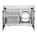 A stainless steel Crown Verity liquid propane grill with a white lid.