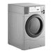 A gray Crossover commercial dryer with a black circle window.