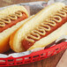 A hot dog with Woeber's Horseradish Mustard in a basket.