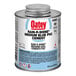 A can of Oatey Rain-R-Shine medium blue liquid cement with a label.