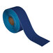 A roll of blue Superior Mark safety tape.