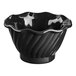 A black plastic dessert dish with wavy edges.