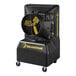 A large black machine with a Big Ass Fans logo and a fan on wheels.