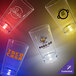 A group of empty 3.5 oz. plastic shot cups with white LED lights.
