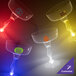 A close-up of a clear plastic guitar stem margarita cup with colorful LED lights.
