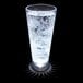 A customizable plastic pilsner cup with a white LED light shining in it.