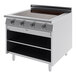 A stainless steel Garland Master Series electric induction range with three burners and storage base.