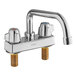 A silver 1.8 GPM deck-mount faucet with 4" centers and 8" swing spout and two chrome handles.