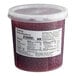 A white container of Fanale raspberry popping boba with red balls inside.