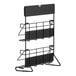 A black metal Bigelow Tea rack with three shelves.