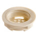 A white plastic air break tank nut for a dishwasher.