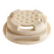 A white plastic circular air break tank nut with holes.