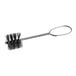 A close-up of the Oatey 1 1/4" Fitting Brush with Wire Handle.