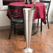 An American Metalcraft silver double wall swirl wine bucket with a bottle in it.