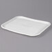 A white Huhtamaki Chinet rectangular molded fiber tray.
