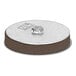 A round stainless steel Josam expansion plug with a small hole in the center.