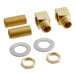 A group of brass threaded pipe fittings and gold nuts.