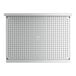 A white stainless steel Regency underbar drainboard with holes in it.