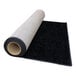 A rolled up black FloorEXP event carpet runner.