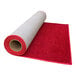 A roll of red FloorEXP event carpet.