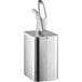 A San Jamar metal countertop condiment pump system with a white handle.