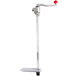 A Vollrath Redco Titan can opener with a red handle on a metal stand.