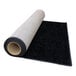 A roll of black carpet on a white background.