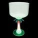 A clear plastic margarita cup with a palm tree stem and green LED light.