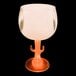 A customizable plastic cactus stem goblet with an orange LED light on a black background.