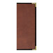 A brown rectangular H. Risch, Inc. tuxedo leather menu cover with gold corners.