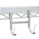 A Metro chrome shelf rack with large snap-on hooks attached.