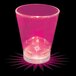 A customizable pink plastic shot cup with a pink LED light inside.