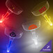 A close-up of a customizable plastic cactus stem margarita cup with a yellow light and a red light.