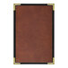 A brown leather menu cover with black border.