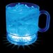 A customizable plastic mug with a blue LED light filled with a blue drink.