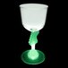 A close-up of a customizable plastic wine cup with a guitar shaped stem and a green LED light inside.