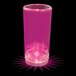 A pink plastic champagne shooter with a pink LED light.