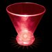 A red plastic stemless martini cup with a light inside.