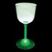 A close-up of a customizable green plastic wine cup with a green LED light on it.
