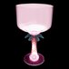 A clear plastic margarita cup with a pink LED light in the stem.