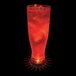 A close up of a 22 oz. plastic pilsner cup filled with red liquid and ice with a red LED light in it.
