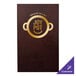 A brown leather H. Risch, Inc. Wine Tuxedo menu cover with picture corners on a table with a brown and gold menu and a restaurant logo.