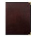 A brown leather H. Risch, Inc. menu cover with black trim.