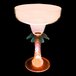 A customizable plastic margarita glass with a palm tree design and an orange LED light.