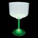 A clear plastic margarita cup with a green stem.