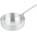 A silver Vollrath Wear-Ever saute pan with a handle.