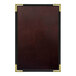 A brown leather wine menu cover with gold trim and interior pocket.